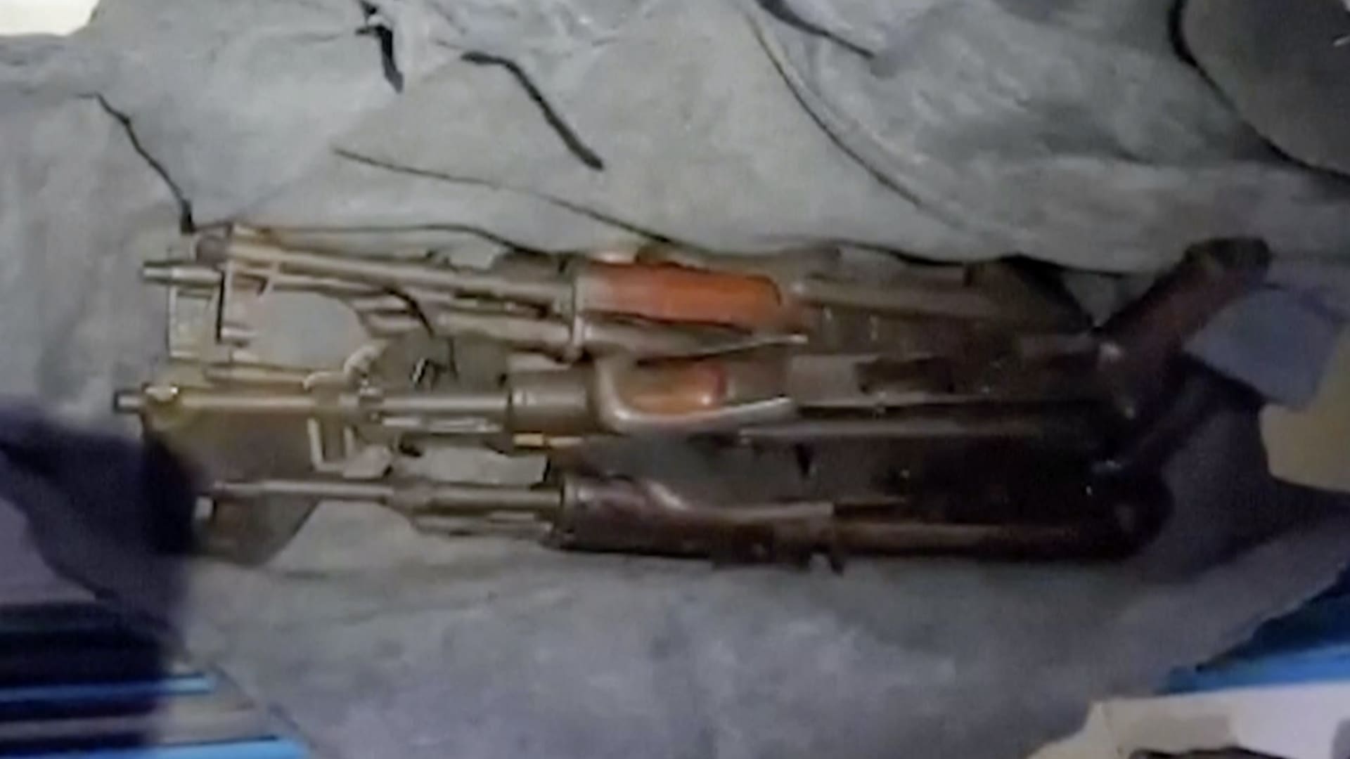 This image taken from a video released by the Israeli Defense Forces, Wednesday, Nov. 15, 2023, shows a cache of weapons the IDF says were found in a closet at the MRI center at al-Shifa hospital in Gaza City.