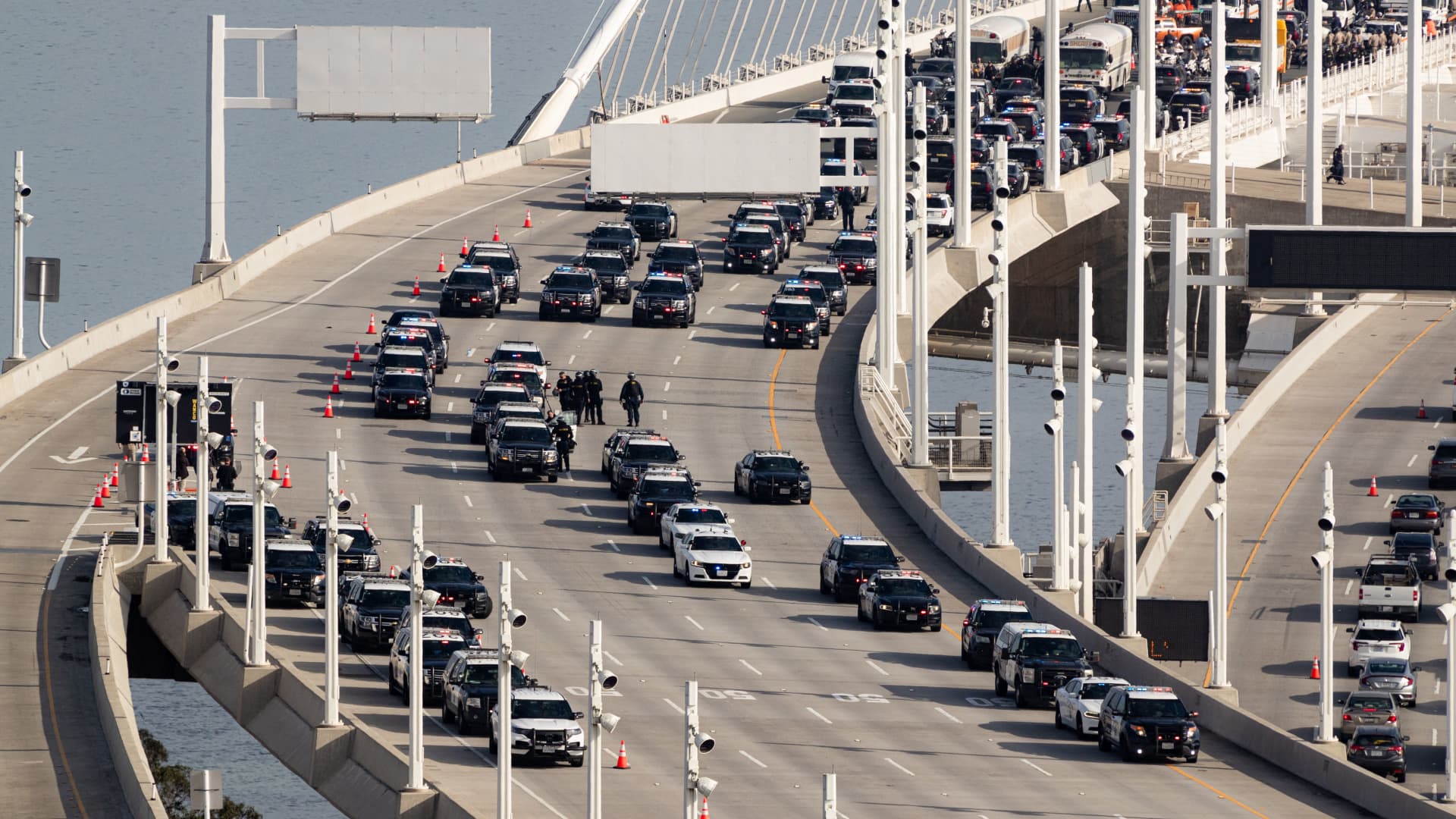 Police respond to protestors who shut down westbound lanes on the eastern span of the Bay Bridge during the Asia-Pacific Econonmic Cooperation (APEC) summit in San Francisco, California, on November 16, 2023. The APEC Summit takes place through November 17. (Photo by Jason Henry / AFP) (Photo by JASON HENRY/AFP via Getty Images)