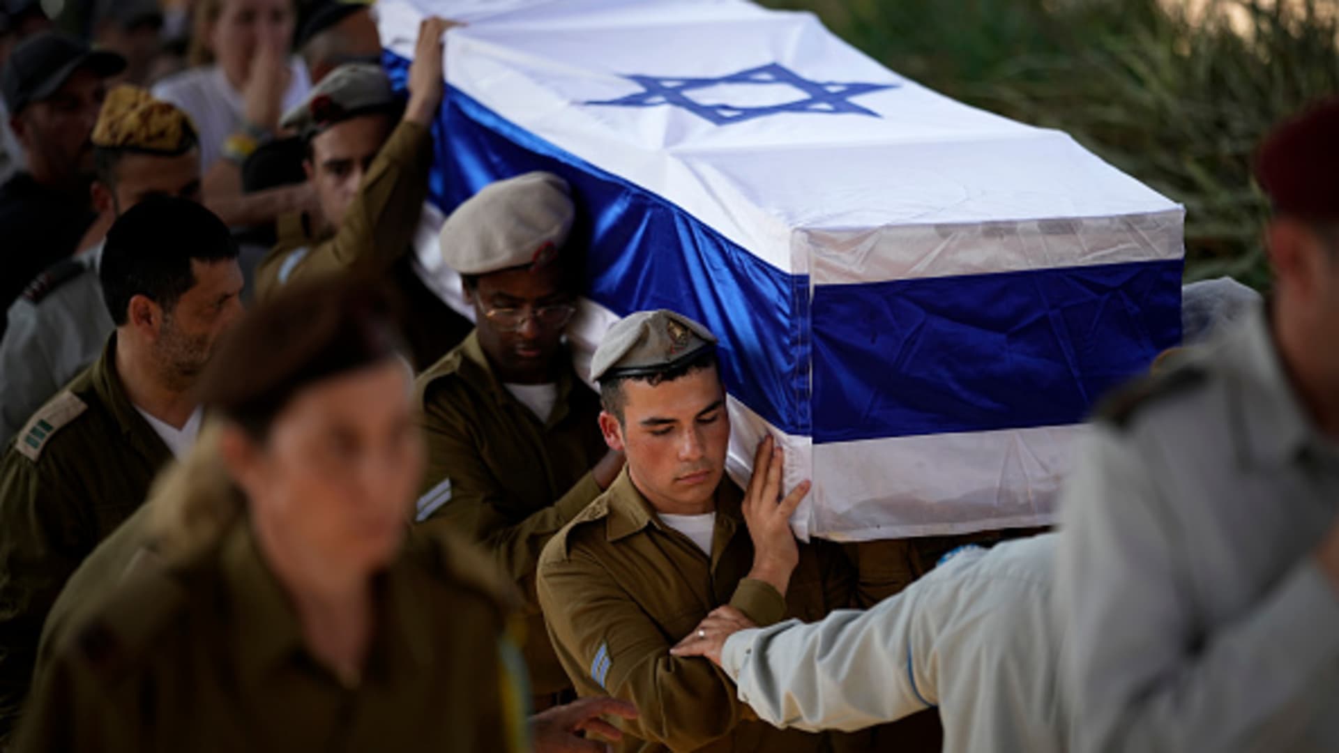Soldiers carry the coffin of Israeli soldier Corporal Noa Marcian at Modi'in Military Cemetery on November 17, 2023 in Modi'in-Maccabim-Re'ut, Israel. 