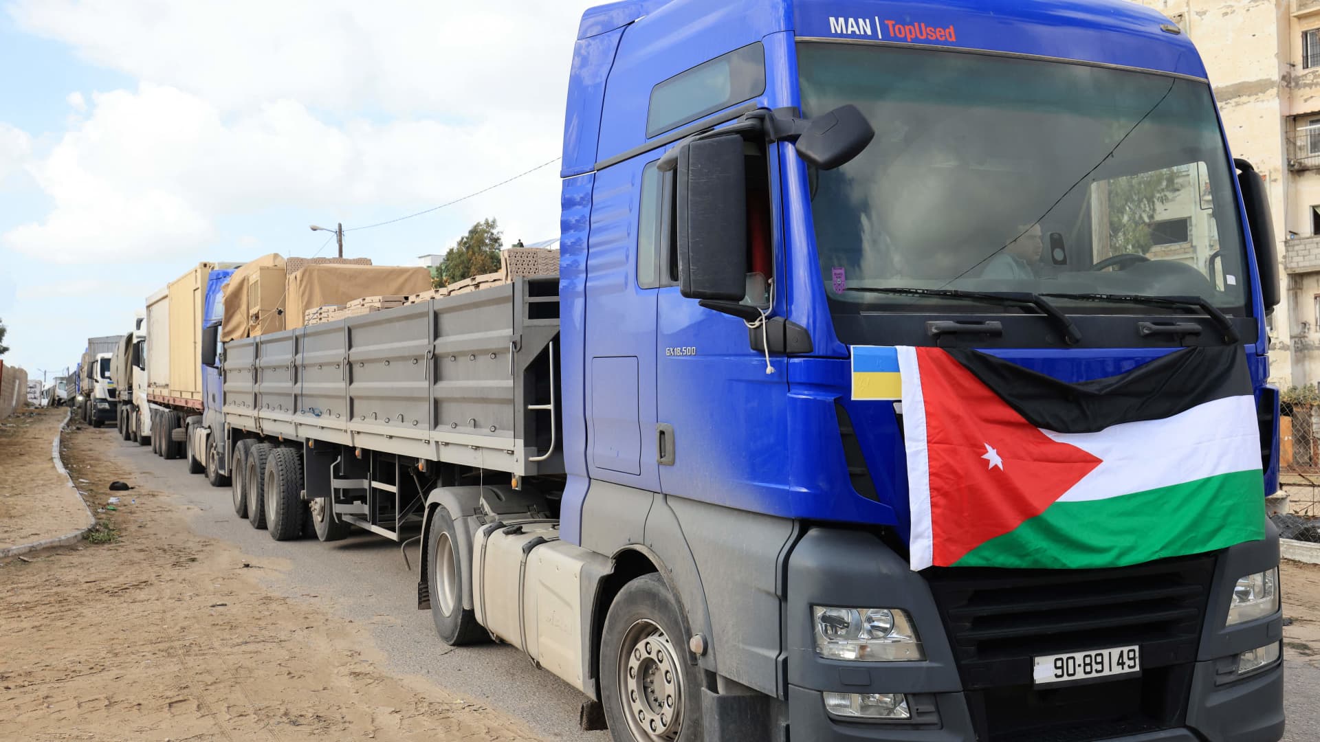 An aid convoy transporting a Jordanian field hospital is seen parked upon arrival in Khan Younis in the southern Gaza Strip on November 20, 2023, after crossing through the Rafah border crossing with Egypt amid continuing battles between Israel and the militant group Hamas. 