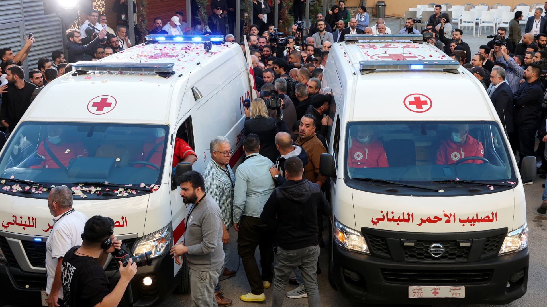 Ambulances carrying the bodies of the two journalists of Lebanon-based Al Mayadeen TV channel, who it says were killed by an Israeli strike, are parked outside the channel's building, in Beirut, Lebanon November 21, 2023. 