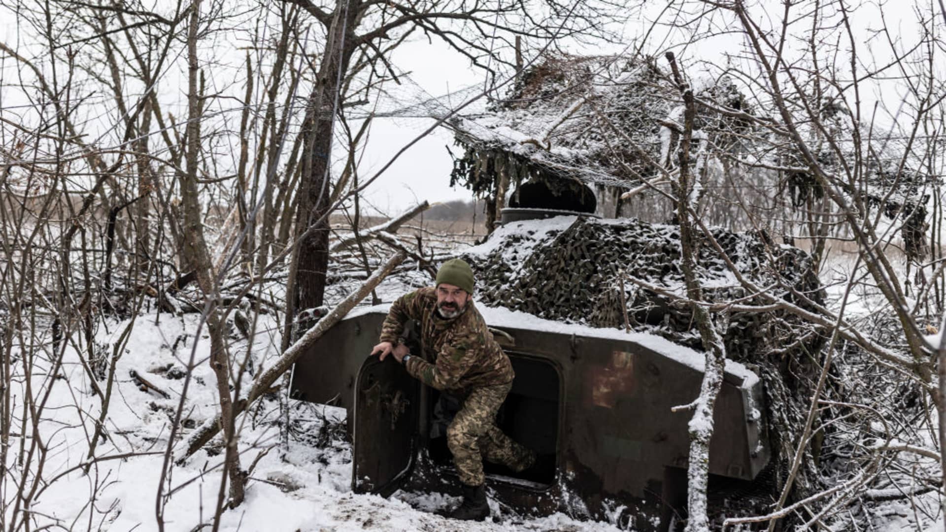 A Ukrainian soldier exits an artillery vehicle at his fighting position as Russia-Ukraine war continues in the direction of Kharkiv, Ukraine, on Nov. 20, 2023.