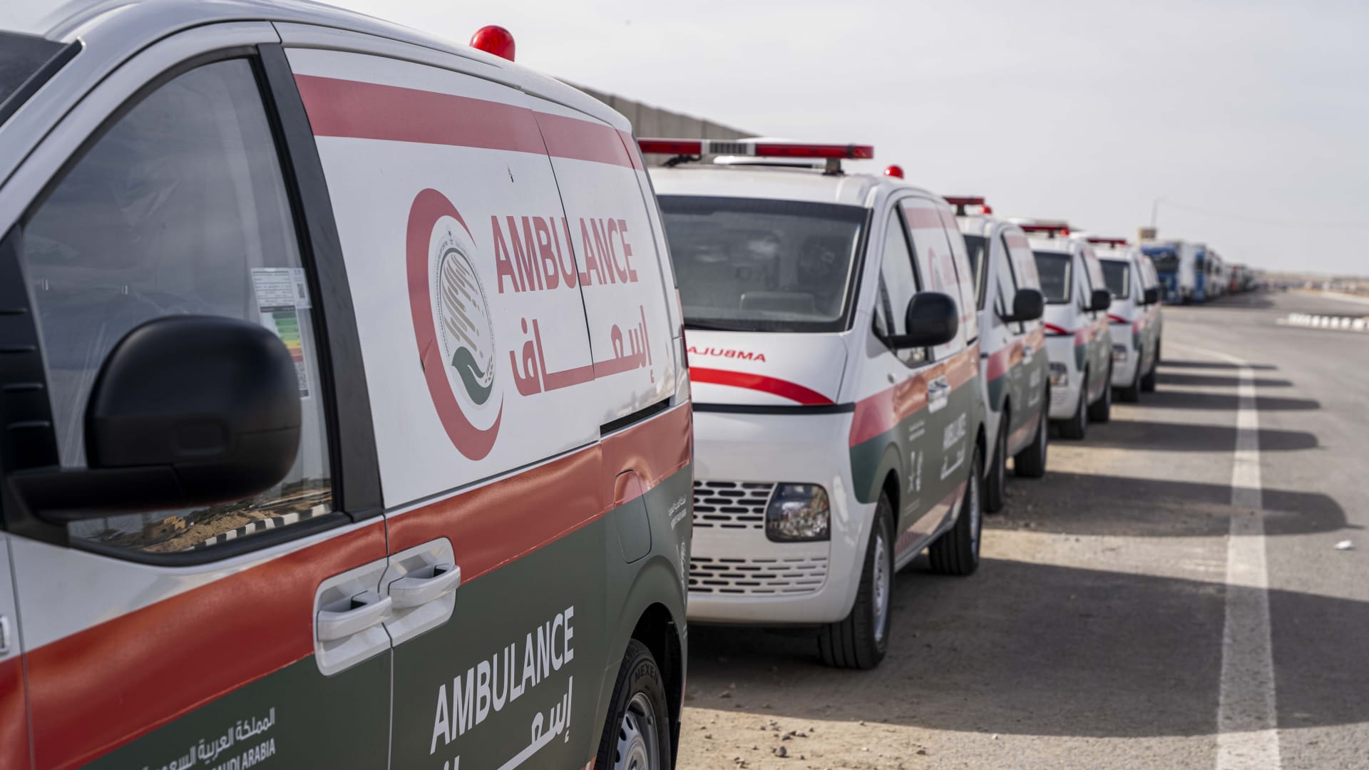 Ambulances used to transport patients from Gaza via the Rafah crossing are seen on November 22, 2023 in Arish, Egypt. 