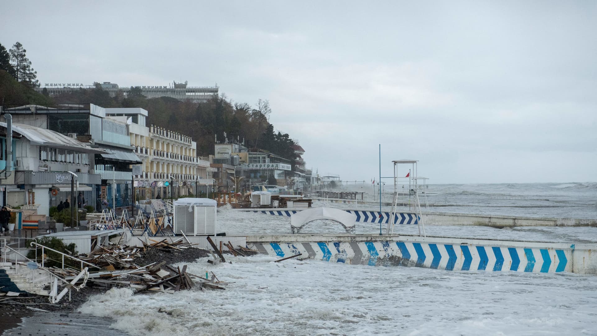 Waves crash against a seafront in the Black Sea resort city of Sochi during a storm on November 27, 2023. (Photo by Mikhail Mordasov / AFP) (Photo by MIKHAIL MORDASOV/AFP via Getty Images)