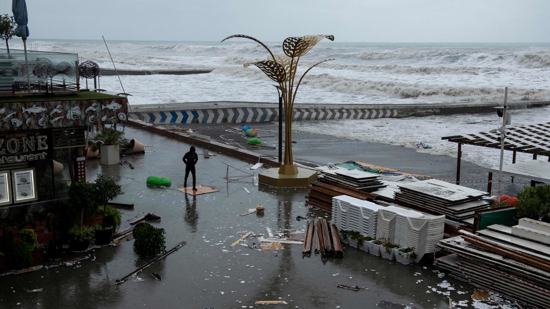 Waves crash against a seafront in the Black Sea resort city of Sochi during a storm on November 27, 2023.