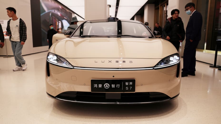 SHANGHAI, CHINA - NOVEMBER 12, 2023 - Customers experience Luxeed S7, the first intelligent pure electric vehicle, at Huawei's flagship store in Shanghai, China, November 12, 2023. (Photo by Costfoto/NurPhoto via Getty Images)