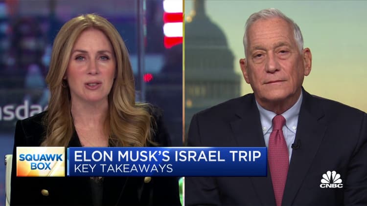 Elon Musk 'shoots himself in the foot' by reposting 'wacky, fringe theories', says Walter Isaacson
