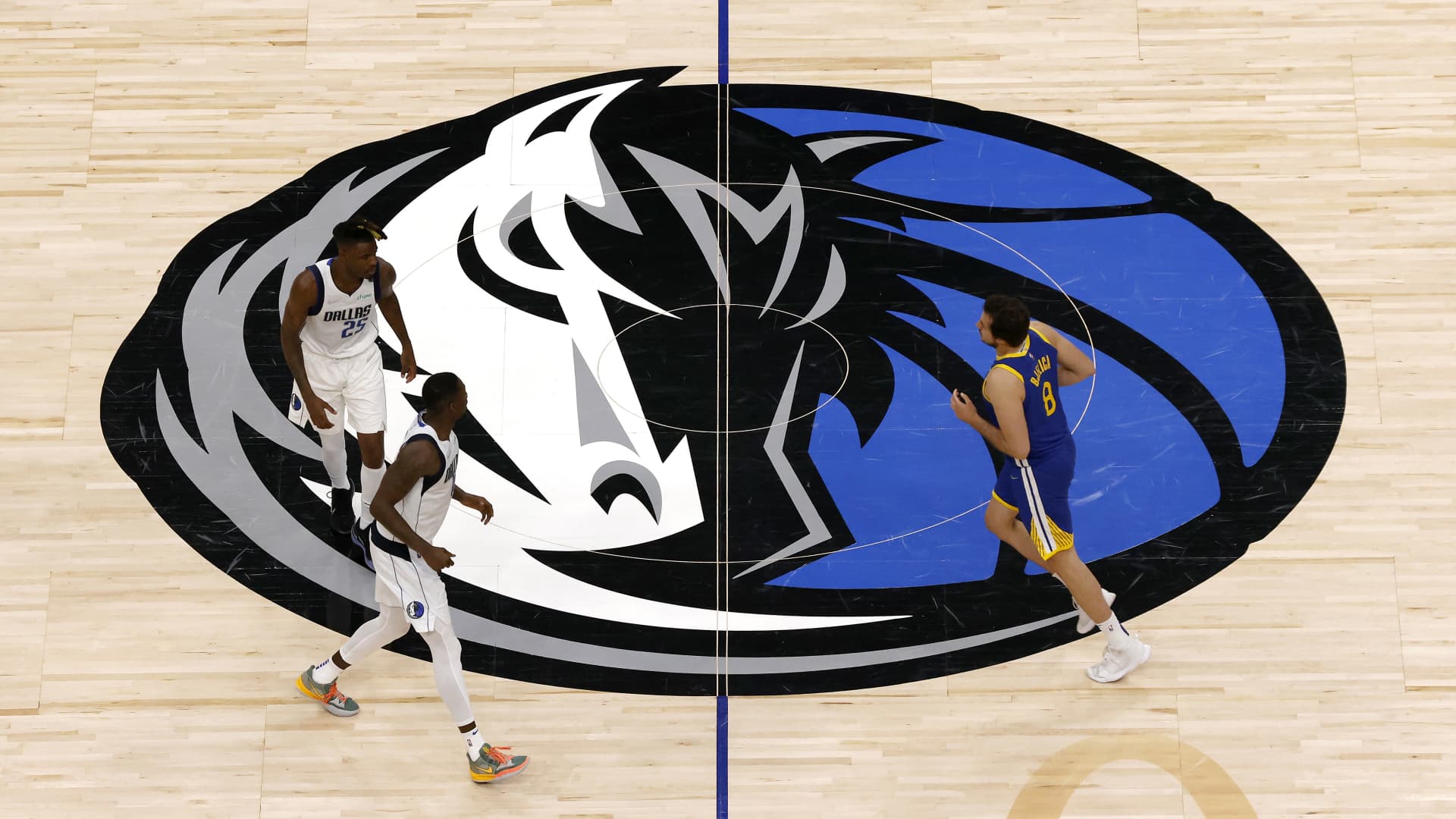 A detailed view of the Dallas Mavericks logo on the court during the fourth quarter in Game Four of the 2022 NBA Playoffs Western Conference Finals between the Golden State Warriors and the Dallas Mavericks at American Airlines Center on May 24, 2022 in Dallas, Texas.