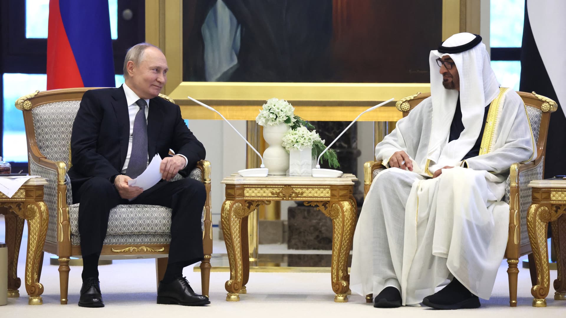 This pool photograph distributed by Russian state agency Sputnik shows Russia's President Vladimir Putin attending a meeting with President of the United Arab Emirates in Abu Dhabi on December 6, 2023. 
