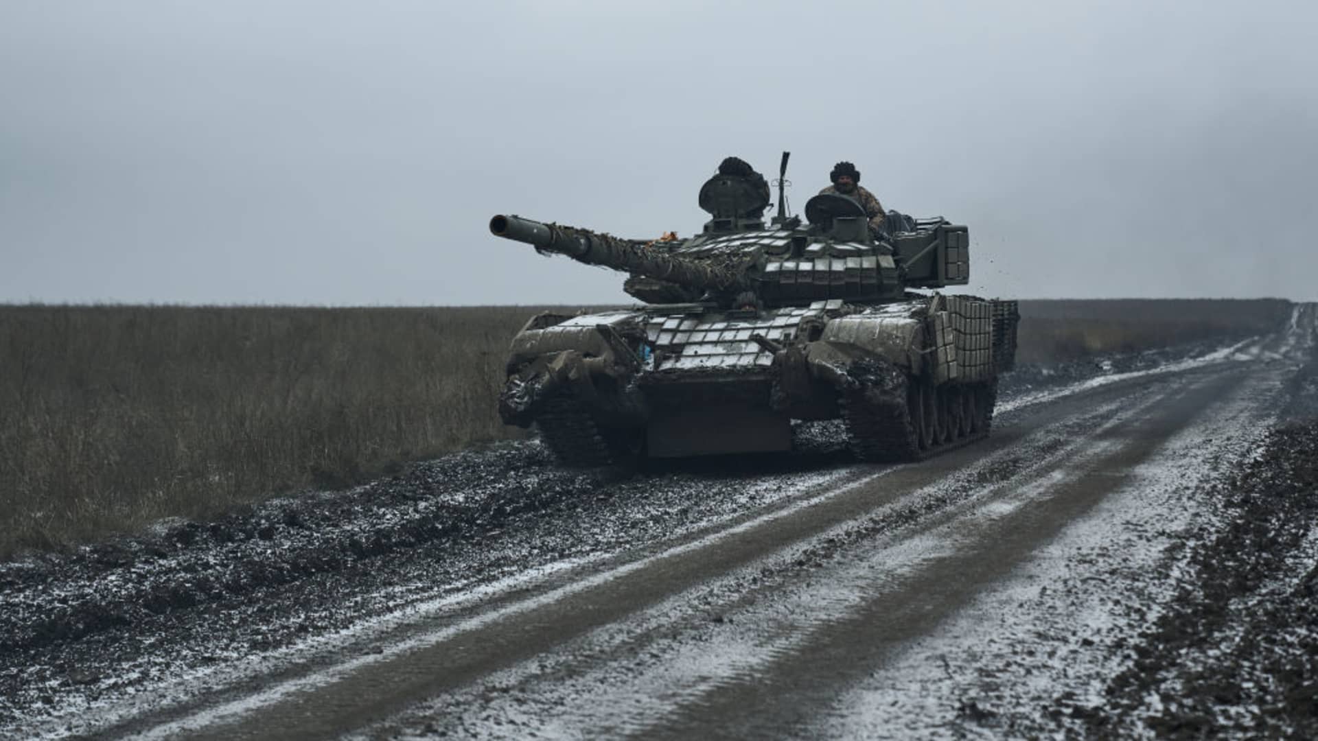 A Ukrainian tank drives along the field on December 7, 2023 in Avdiivka, Ukraine.