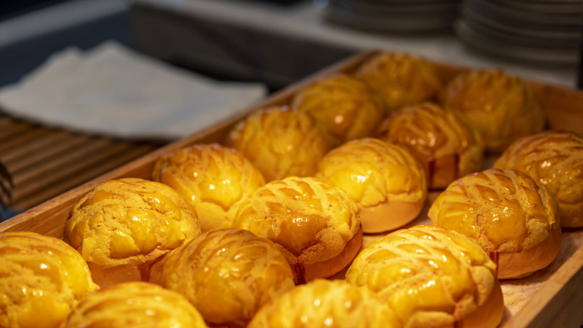 Pineapple buns, commonly known as bolo buns, are a popular snack in Hong Kong.