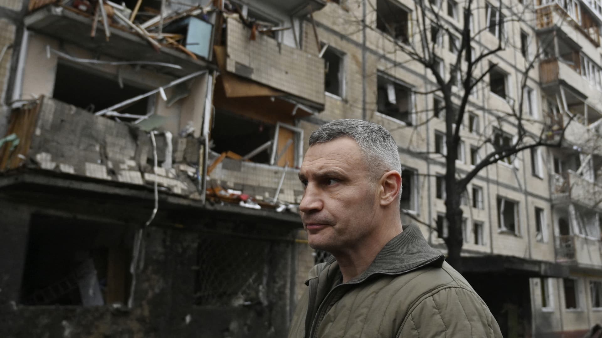 Kyiv's mayor of Vitali Klitschko stands next to a damaged residential building following a missile strike in Kyiv on December 13, 2023, amid Russian invasion of Ukraine. (Photo by SERGEI CHUZAVKOV / AFP) (Photo by SERGEI CHUZAVKOV/AFP via Getty Images)