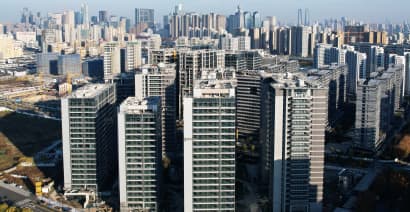 Strained Chinese cities struggle to pay home buying subsidies