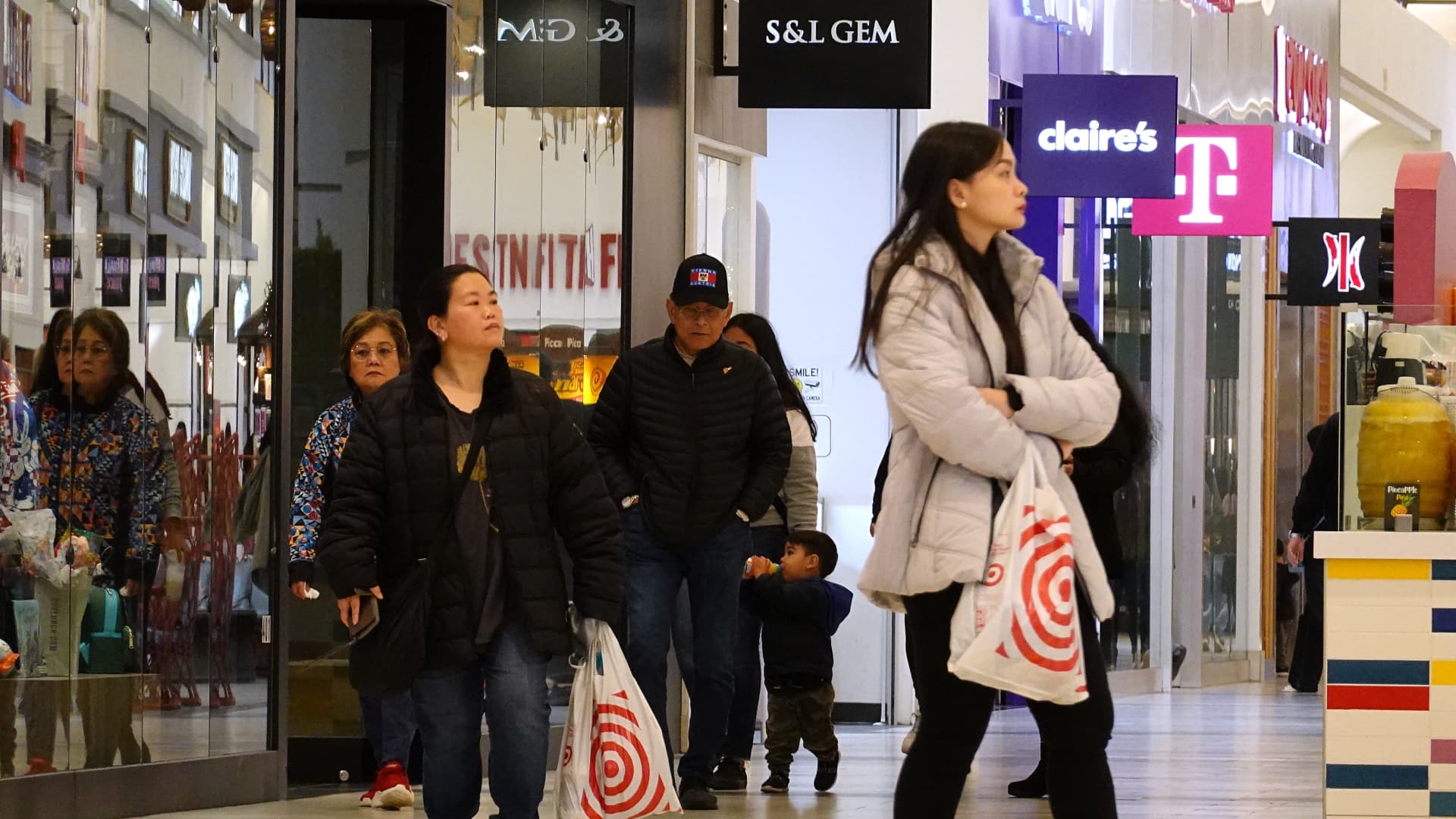 Customers shop at Serramonte Center on December 14, 2023 in Daly City, California. 