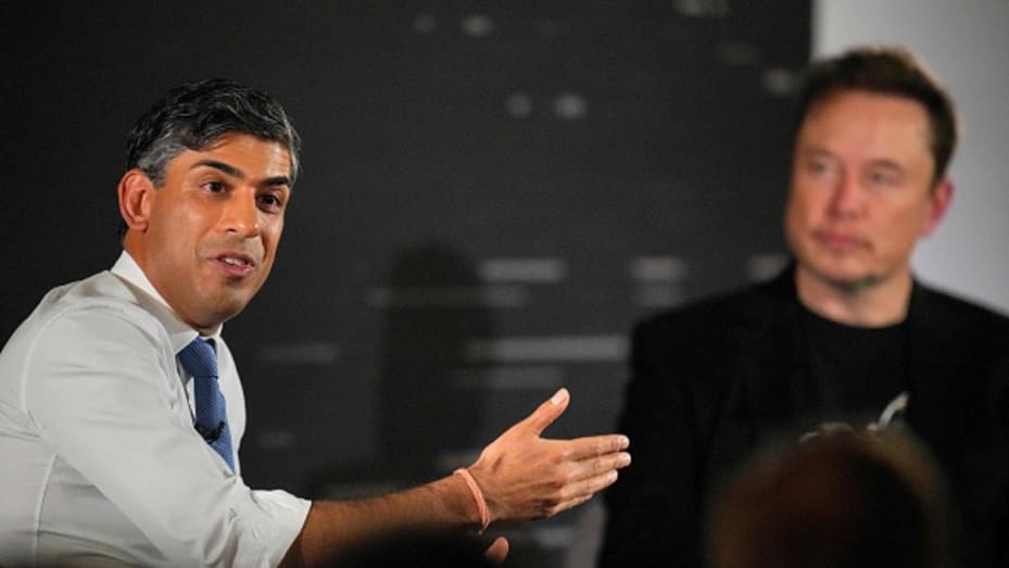 Britain's Prime Minister Rishi Sunak (L) attends an in-conversation event with X (formerly Twitter) CEO Elon Musk (R) in London on November 2, 2023, following the UK Artificial Intelligence (AI) Safety Summit. (Photo by Kirsty Wigglesworth / POOL / AFP) (Photo by KIRSTY WIGGLESWORTH/POOL/AFP via Getty Images)