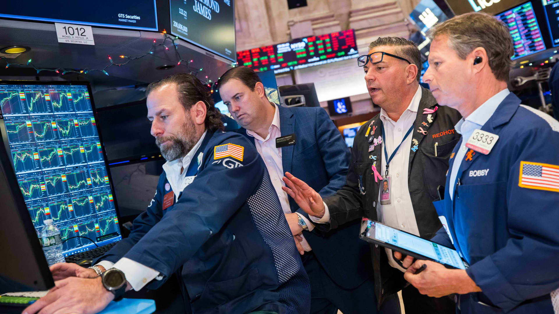 Dow closes 100 points higher Wednesday, S&P 500 hovers near a record high: Live updates