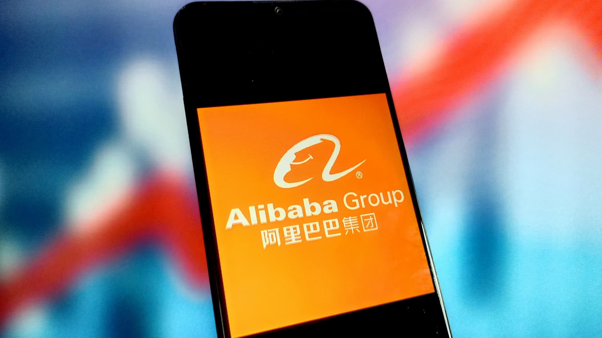 Alibaba shares whipsaw in premarket trade after revenue miss, $25 billion boost to buyback plan