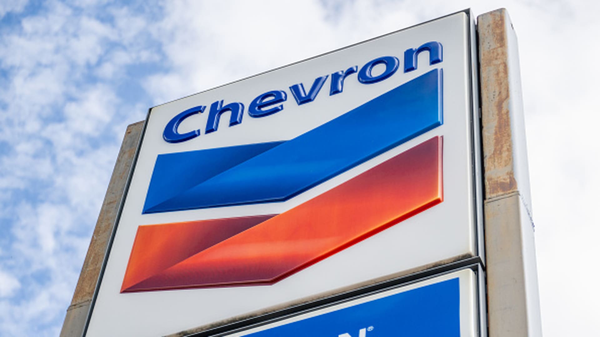 Chevron earnings fall but shareholders see record windfall in 2023, company raises dividend 8%