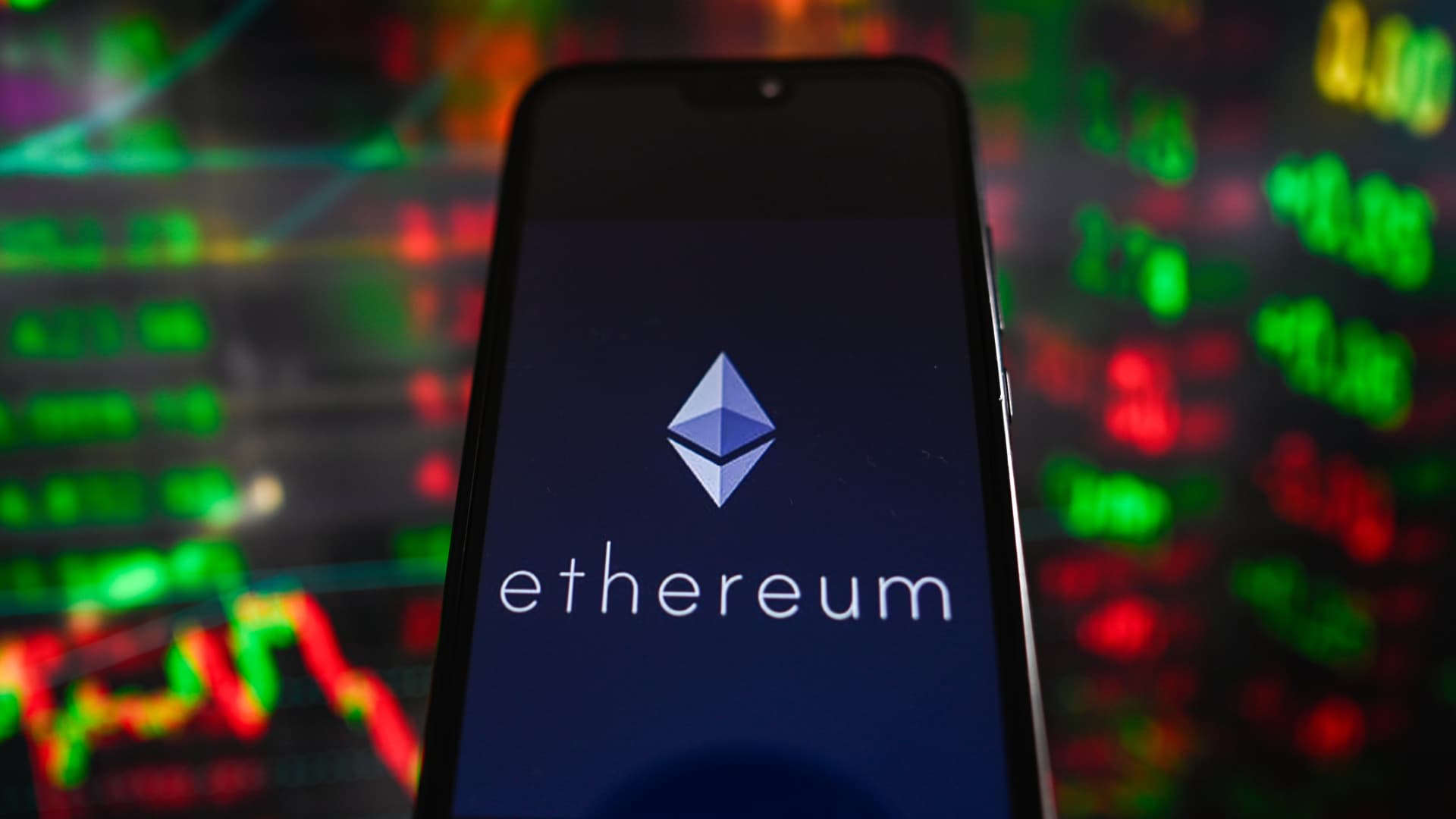 Ether extends gains, bitcoin slides after hitting a new record