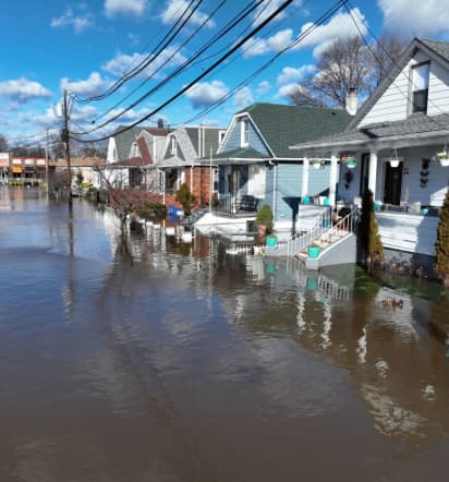 East Coast residents struggle with flooding and power outages after storms ripped across the U.S.