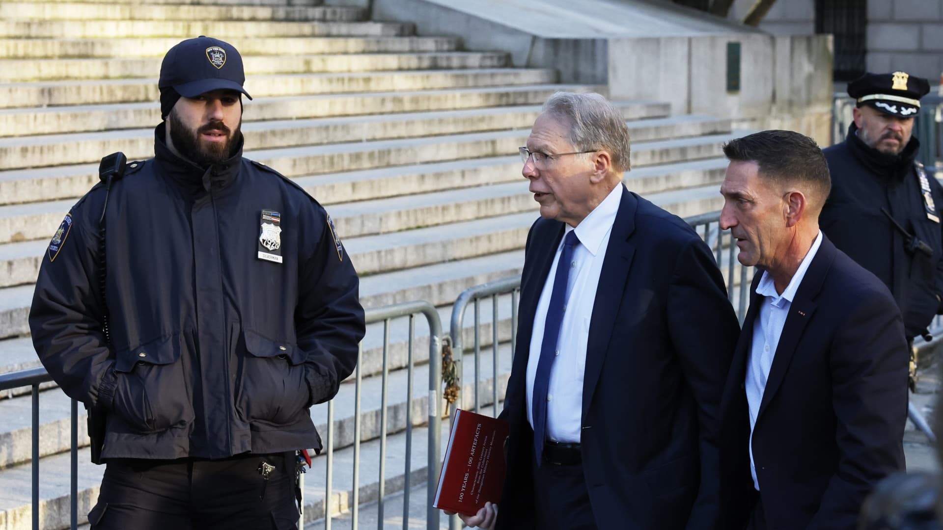 Former NRA chief Wayne LaPierre, center, arrives for his civil trial at the New York State Supreme Court in New York City on Jan. 11, 2024.