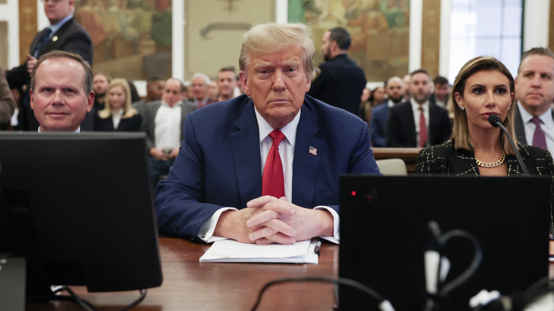 Former US President Donald Trump sits at the New York State Supreme Court during the civil fraud trial against the Trump Organization, in New York City on January 11, 2024. 