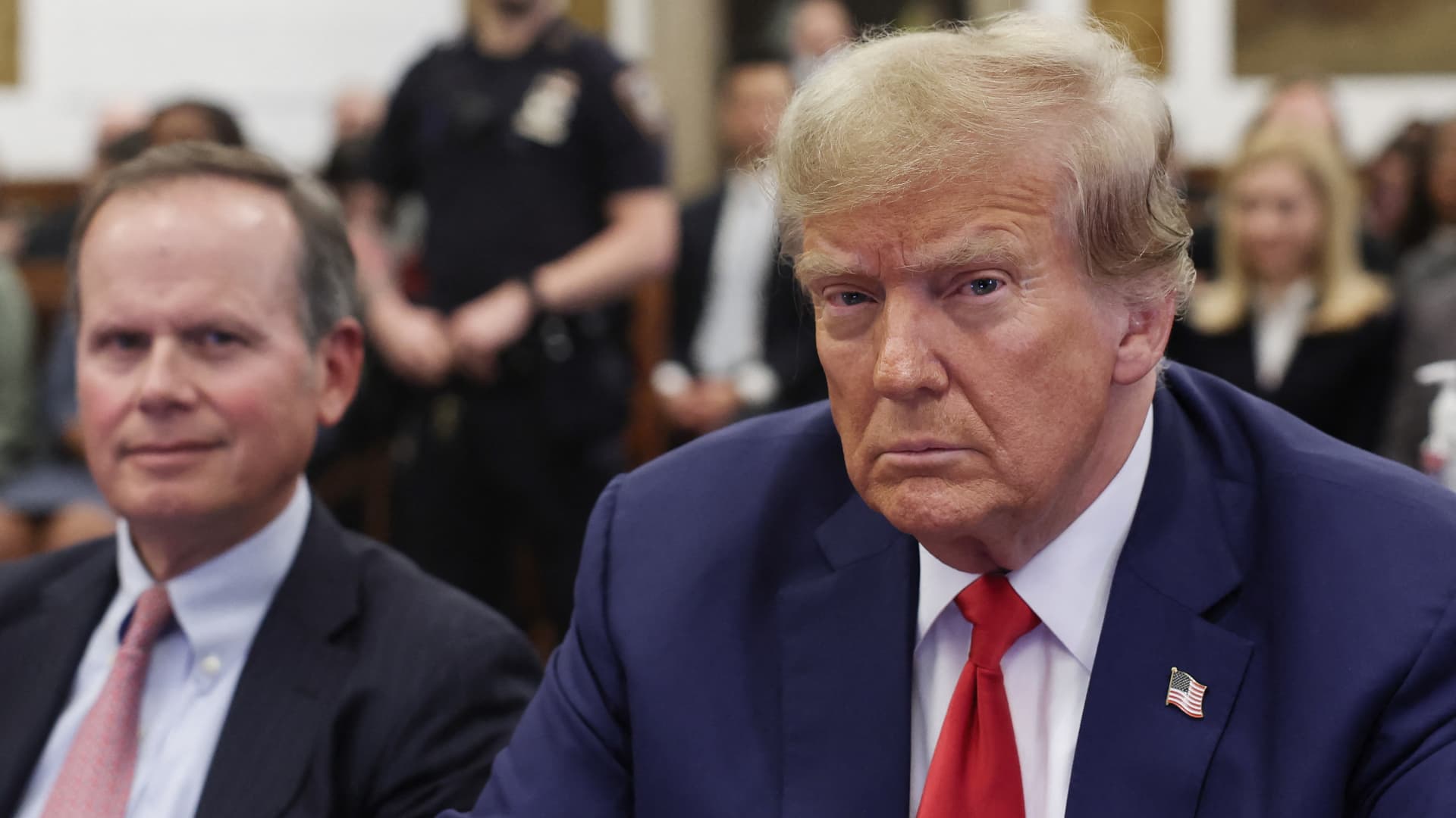 Former US President Donald Trump sits at the New York State Supreme Court during the civil fraud trial against the Trump Organization, in New York City on January 11, 2024.