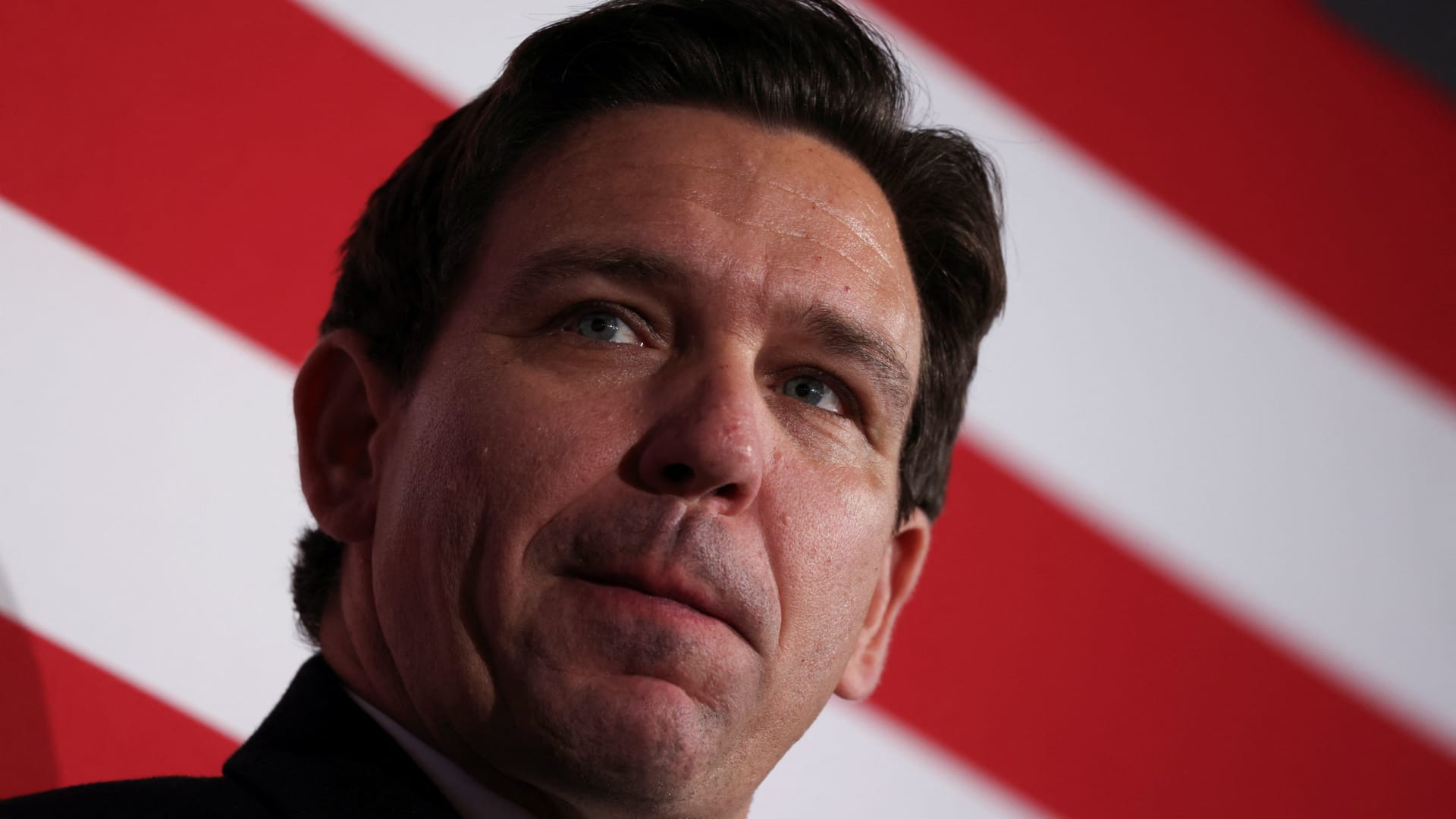 Republican presidential candidate and Florida Governor Ron DeSantis looks on during a campaign event at the Chrome Horse Saloon ahead of the caucus vote in Cedar Rapids, Iowa, U.S., January 14, 2024. 