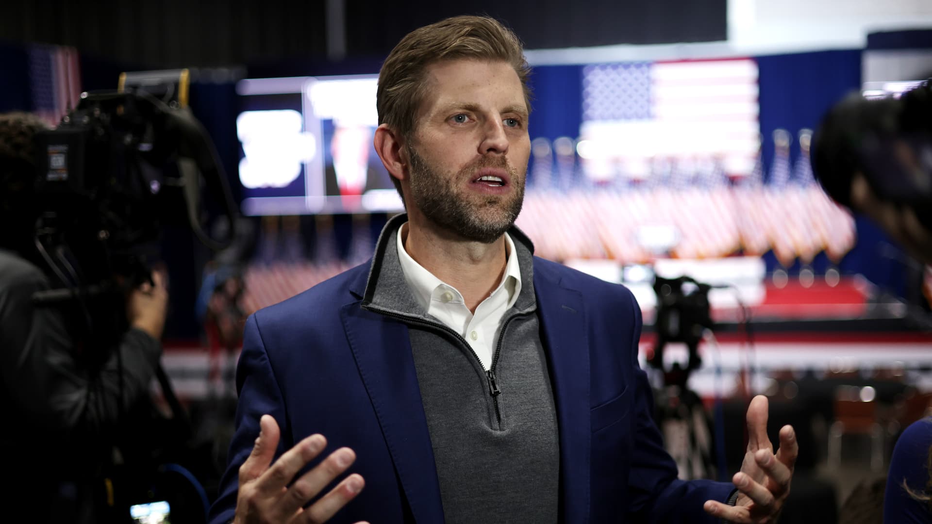 Former President Donald Trump's son Eric Trump speaks to media before his father's caucus night event at the Iowa Events Center on January 15, 2024 in Des Moines, Iowa.