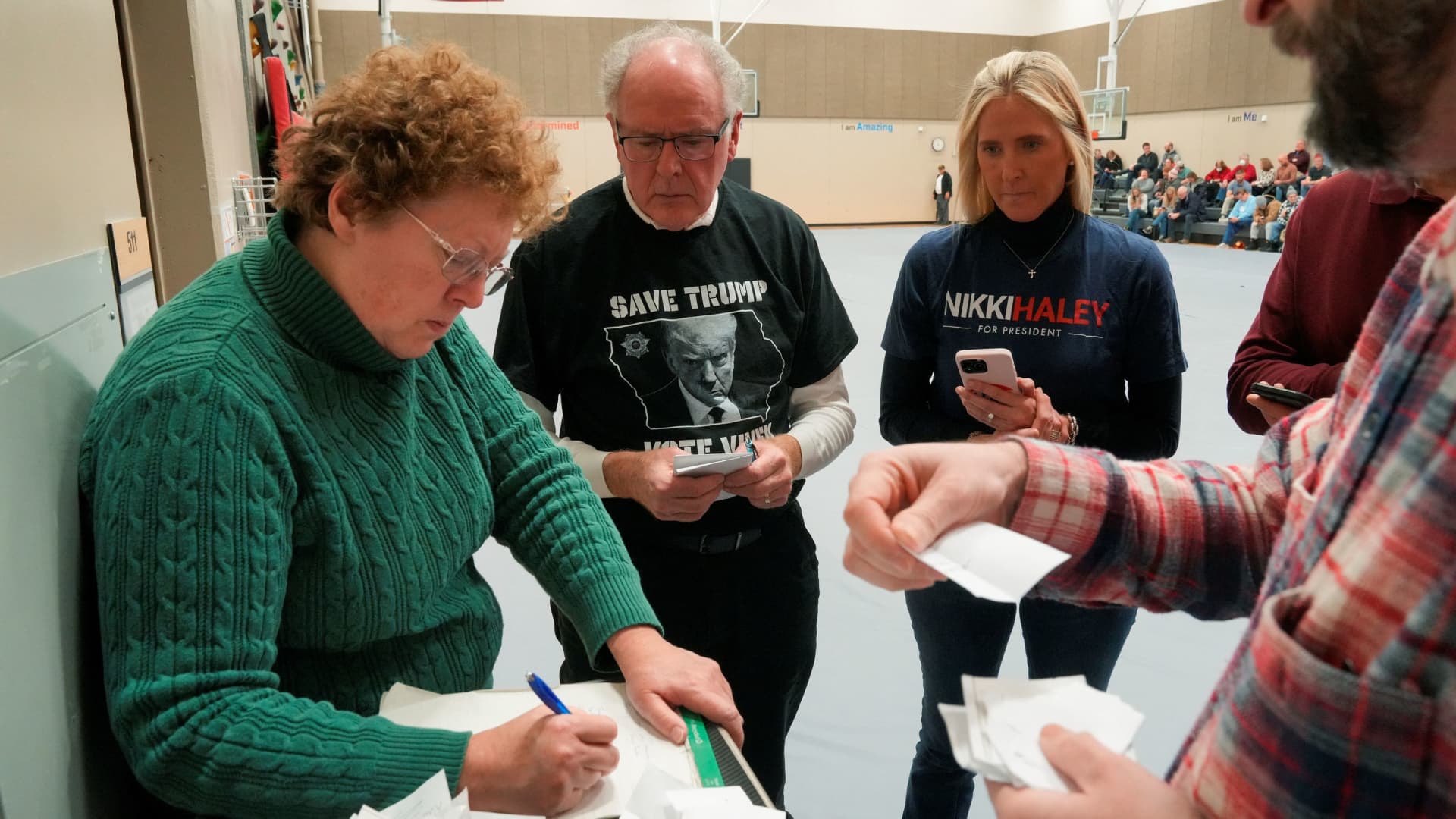 Votes are counted during a caucus to choose a Republican presidential candidate, at Fellows Elementary School, in Ames, Iowa, U.S. January 15, 2024. 