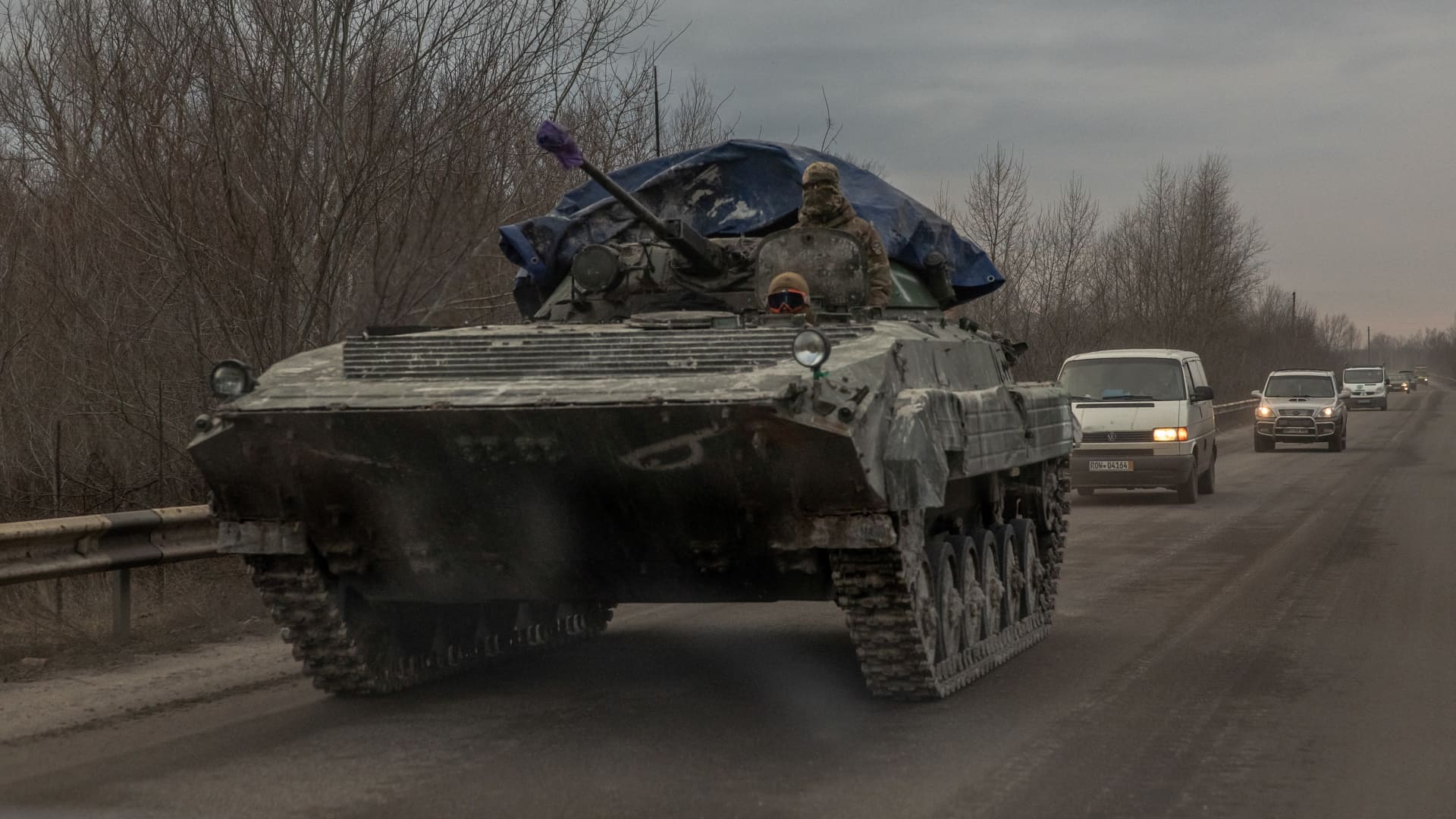 Ukrainian soldiers ride on an armored military vehicle on a road in Lyman district, Donetsk region, on January 21, 2024, amid the Russian invasion of Ukraine. 