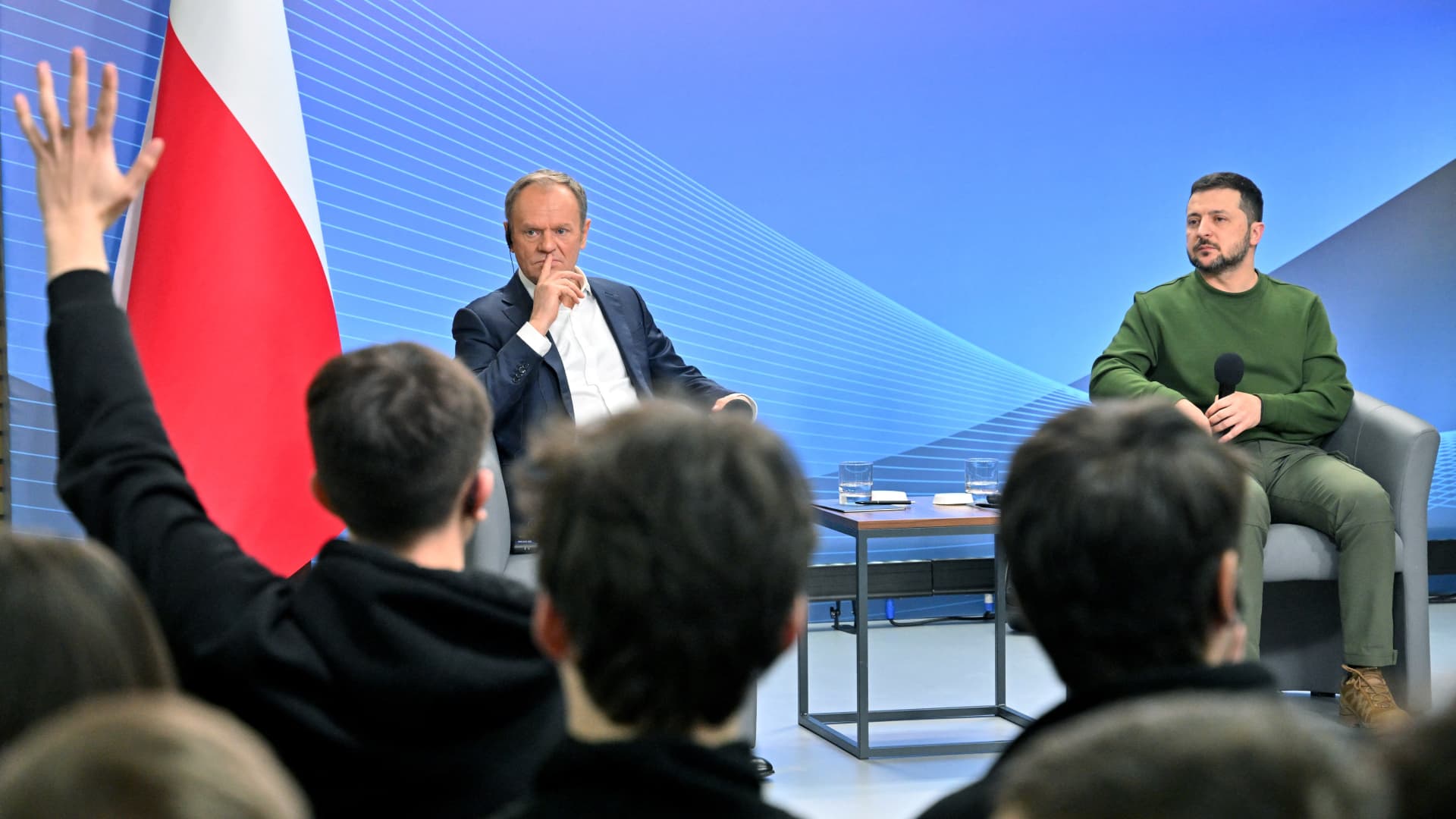 Ukrainian President Volodymyr Zelensky (R) and Polish Prime Minister Donald Tusk take part in a meeting with Ukrainian students in Kyiv on January 22, 2024. (Photo by Sergei SUPINSKY / AFP) (Photo by SERGEI SUPINSKY/AFP via Getty Images)