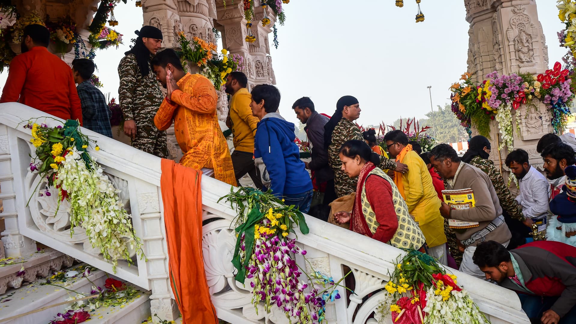 AYODHYA, INDIA - JANUARY 23: Devotees queue to get glimpse of a statue of the hindu god Ram one day after consecration ceremony of the Ram Mandir on January 23, 2024 in Ayodhya, India. The Ram Mandir, a temple built at a site thought to be the birth place of Lord Rama, a significant figure in Hindu religion, was inaugurated on Jan. 22, 2024. (Photo by Ritesh Shukla/Getty Images)