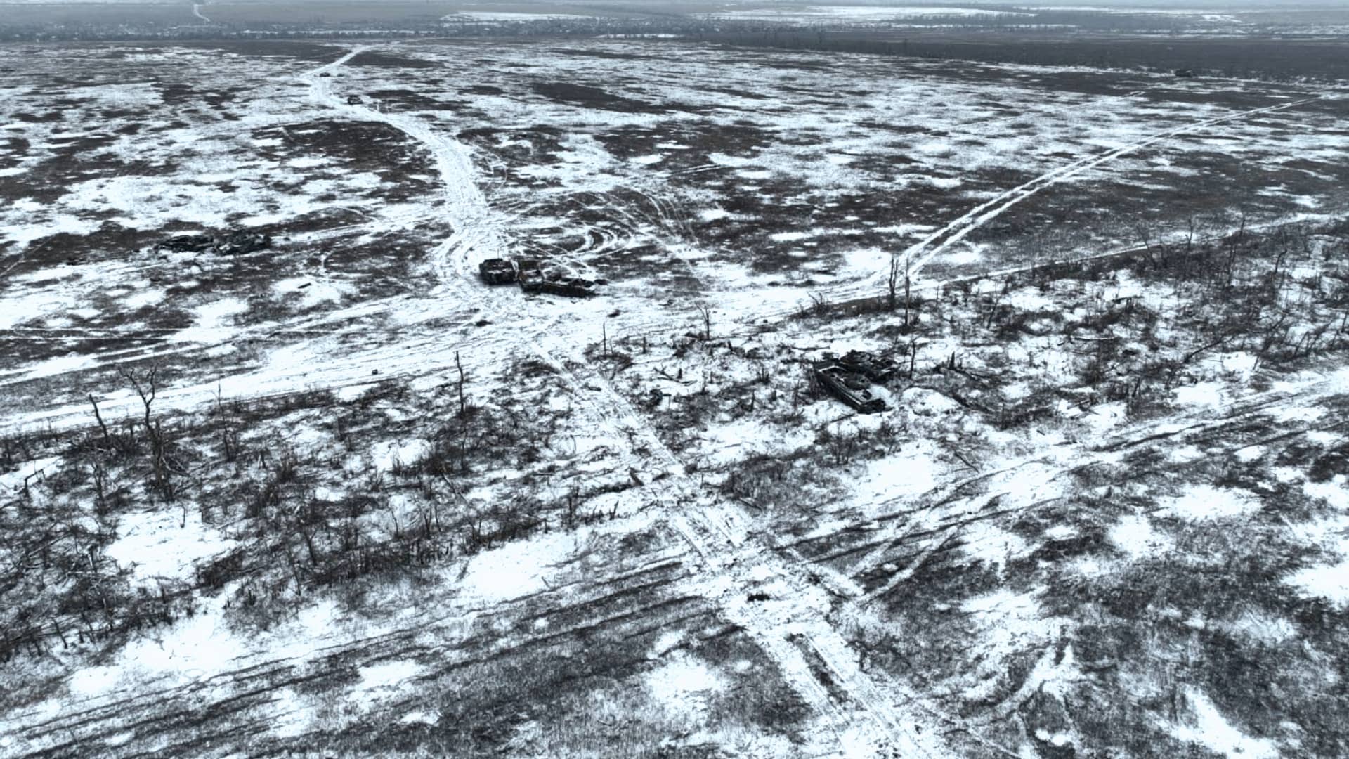  A snowy field with traces of artillery and recently destroyed Russian heavy equipment on the outskirts of the city on January 25, 2023 in Avdiivka, Ukraine. Both Ukraine and Russia have recently claimed gains in the Avdiivka, where Russia is continuing a long-running campaign to capture the city, located in the Ukraine's eastern Donetsk Region. 