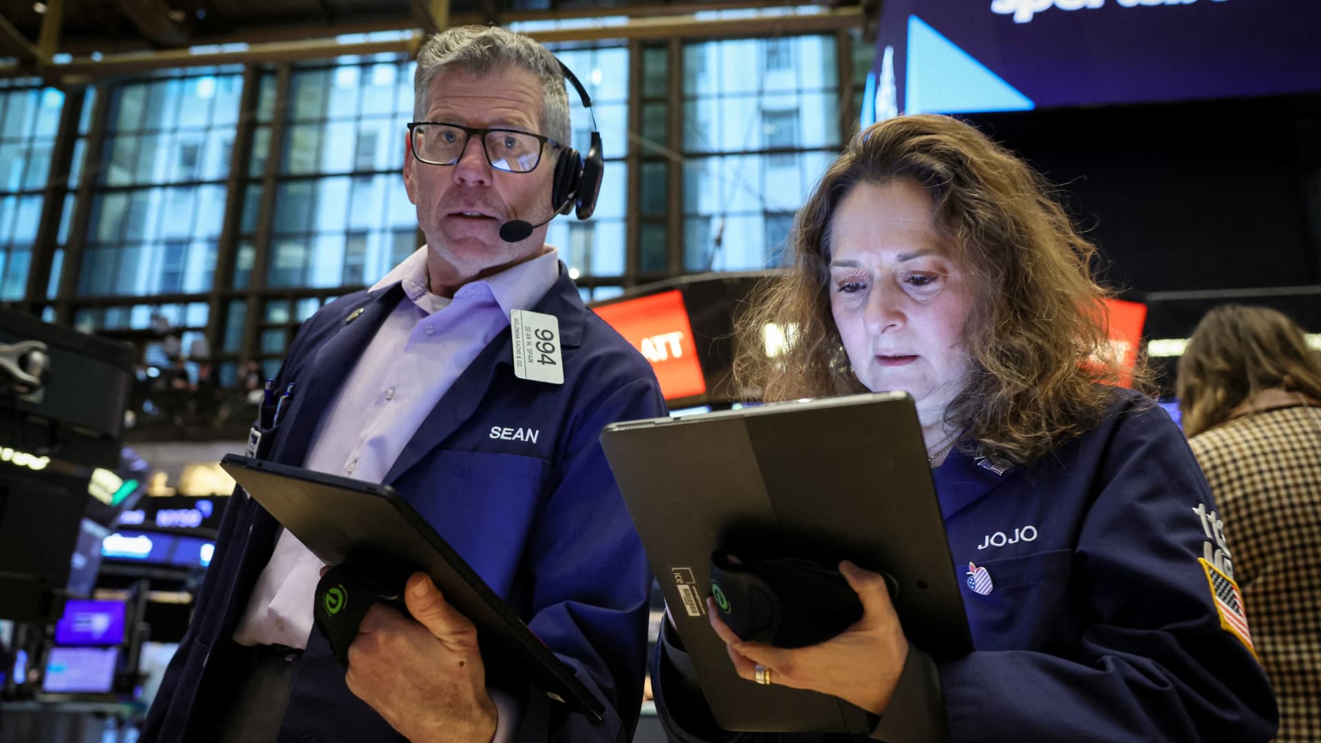Traders work on the floor at the New York Stock Exchange on Jan. 29, 2024.