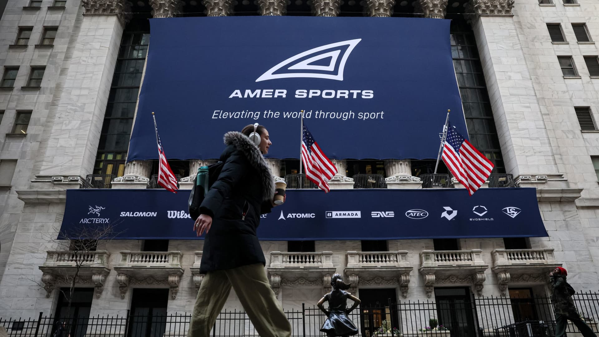 Amer Sports, (AS.N) parent company of sporting goods brands, banner hangs on the front of the New York Stock Exchange (NYSE) during the company's IPO in New York City, U.S., February 1, 2024. 