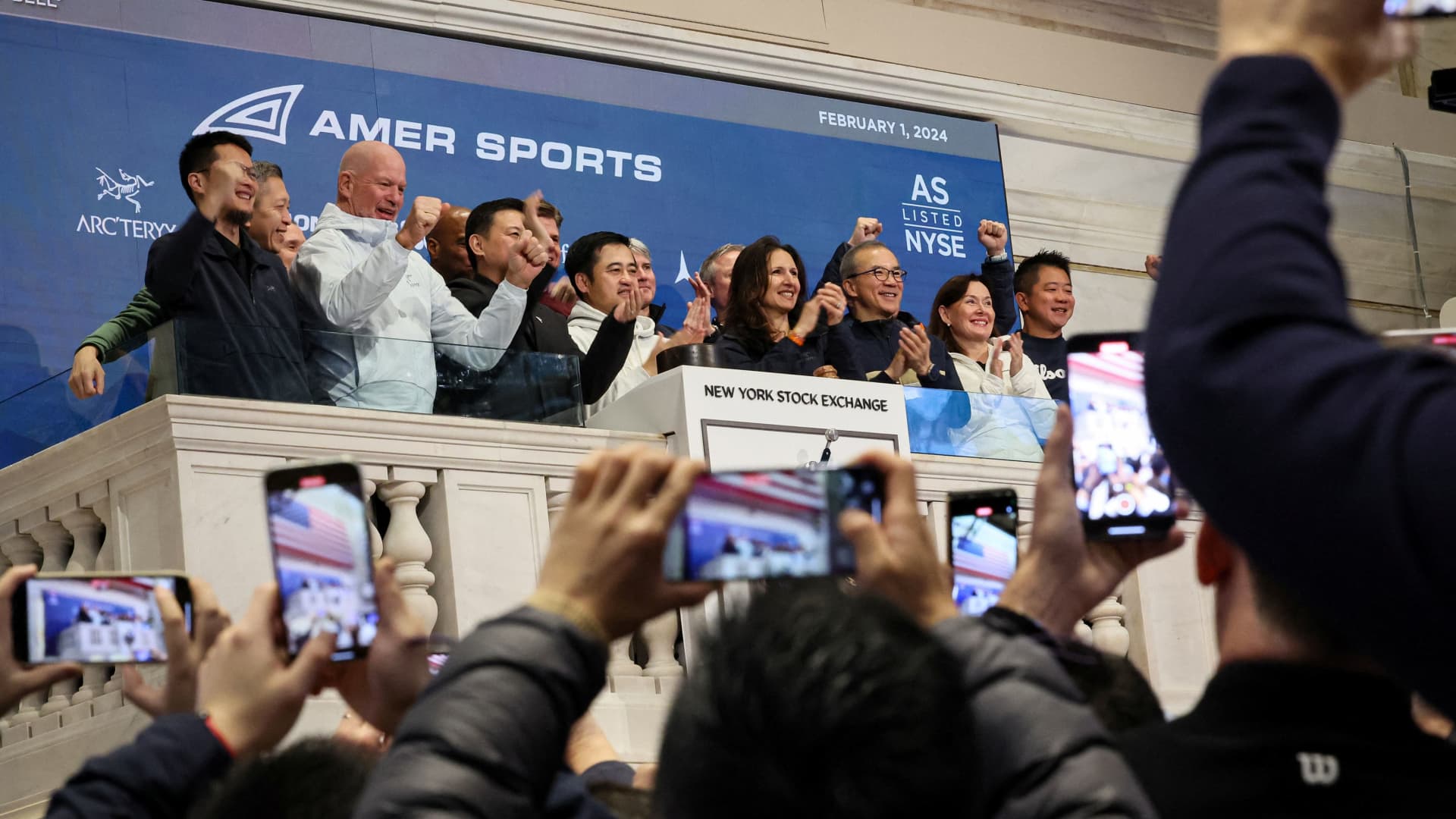 Wilson tennis racket maker Amer Sports opens at $13.40 per share in market debut after pricing IPO at $13