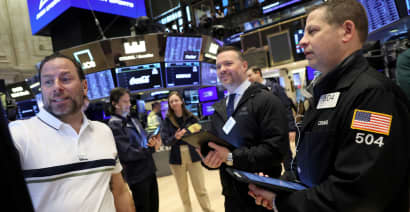 Cramer tells investors to buy the earnings-driven declines in 2 portfolio stocks