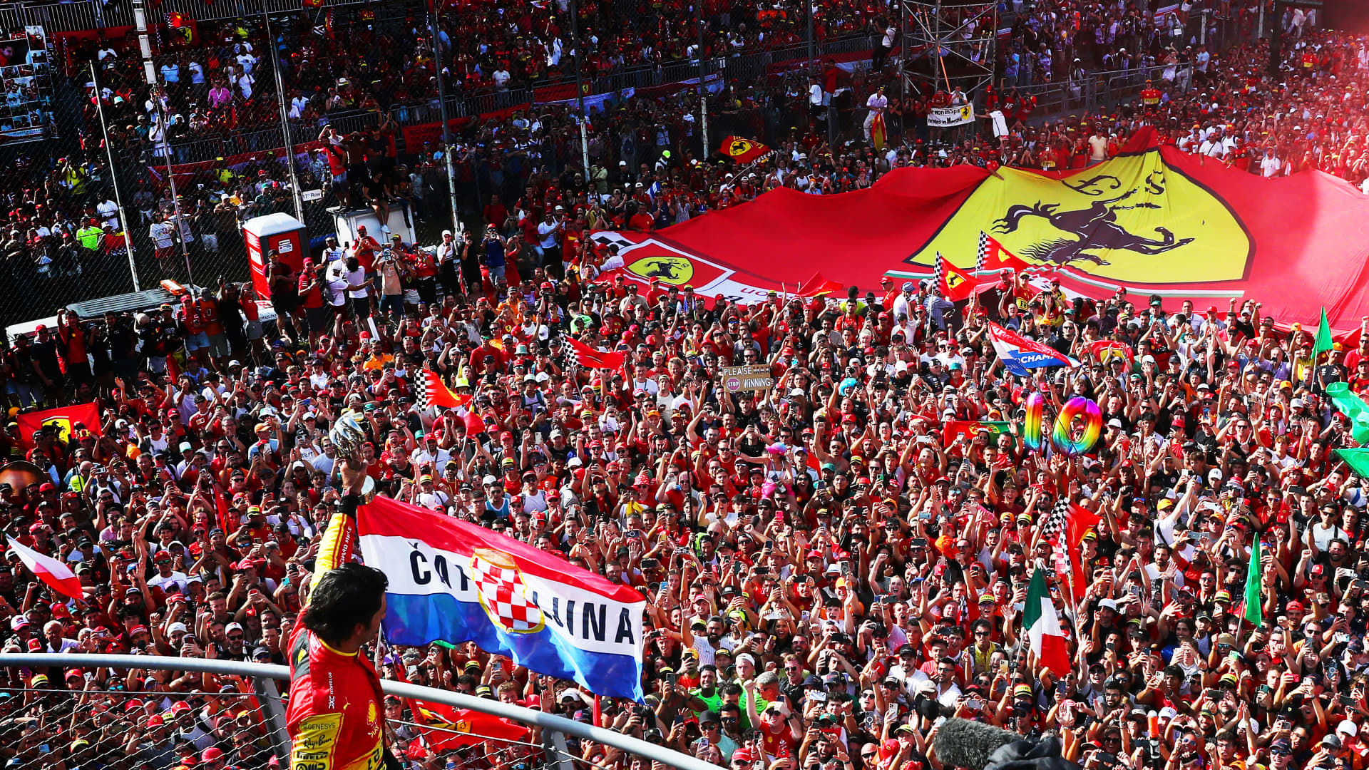 Third placed Carlos Sainz of Spain and Ferrari celebrates on the podium during the F1 Grand Prix of Italy at Autodromo Nazionale Monza on September 03, 2023 in Monza, Italy.