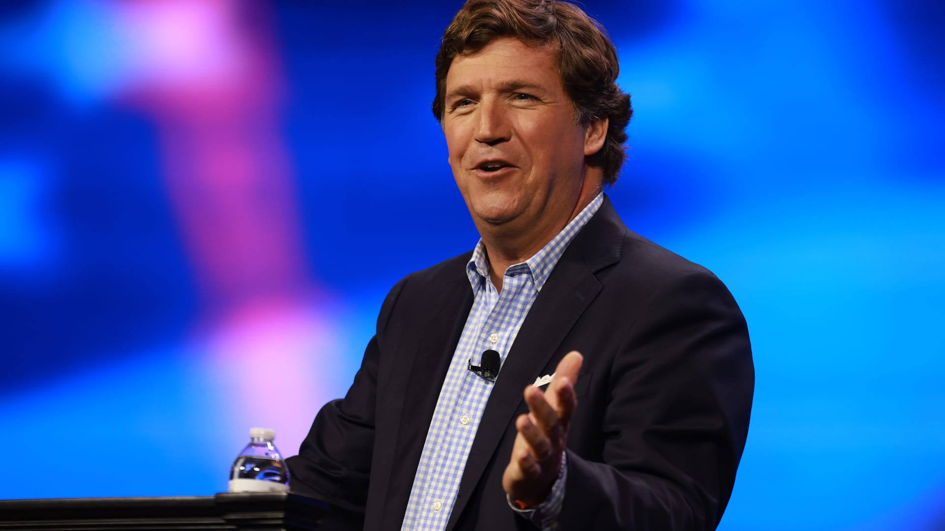Tucker Carlson speaks at the Turning Point Action conference on July 15, 2023 in West Palm Beach, Florida. 