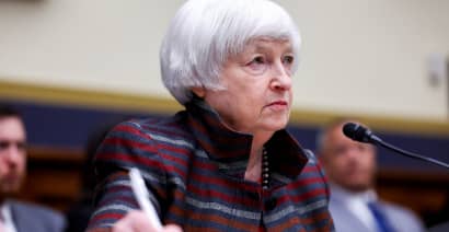 Yellen touts electric vehicle 'boom' as automakers tone down hype