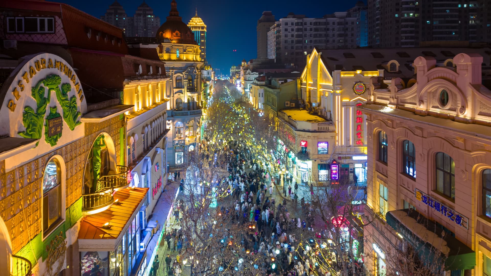 Tourists walking down Harbin's Central Street on Jan. 9, 2024. 