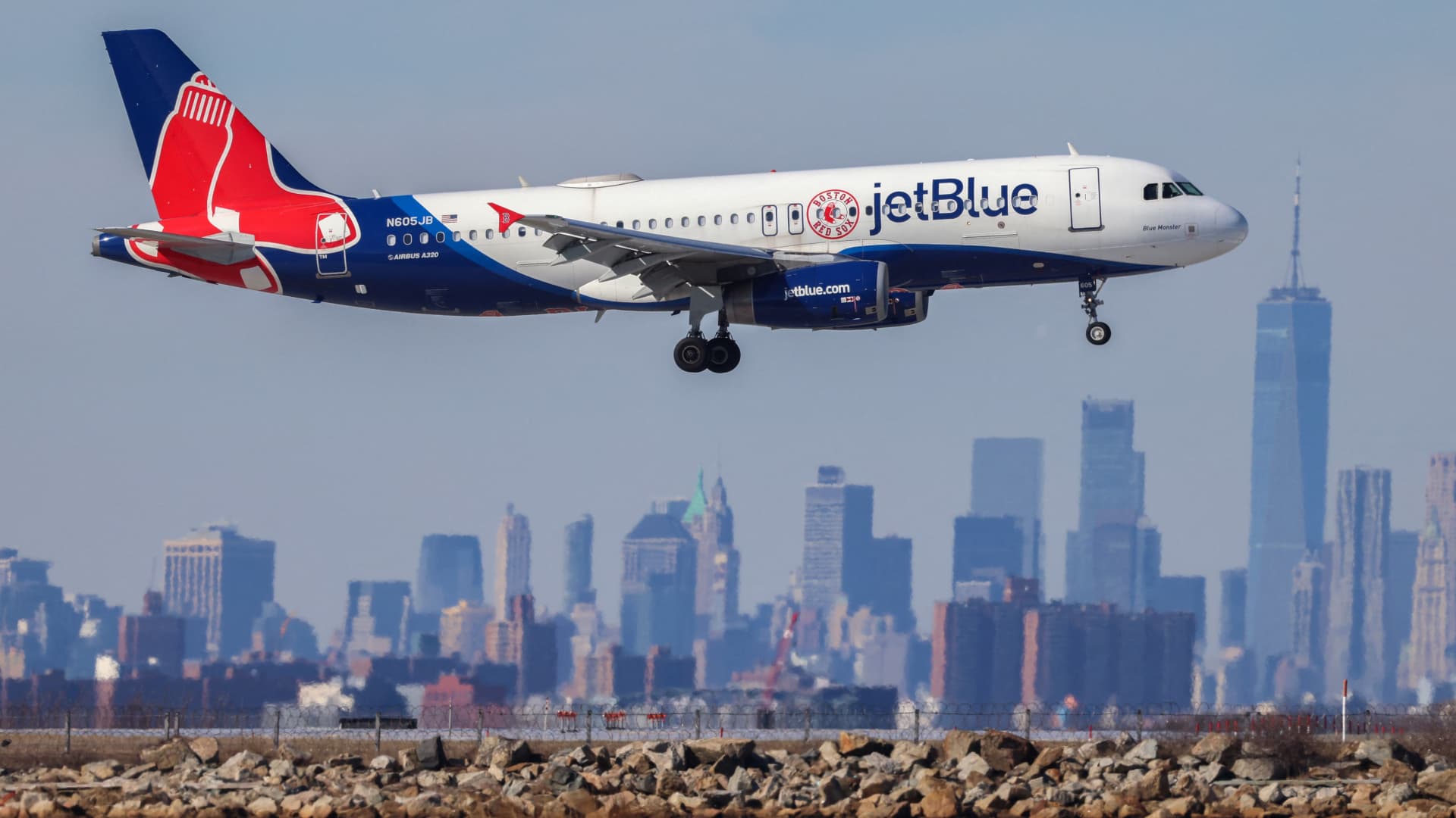 Shares making the largest strikes noon: JetBlue Airways, Shopify, Biogen and extra