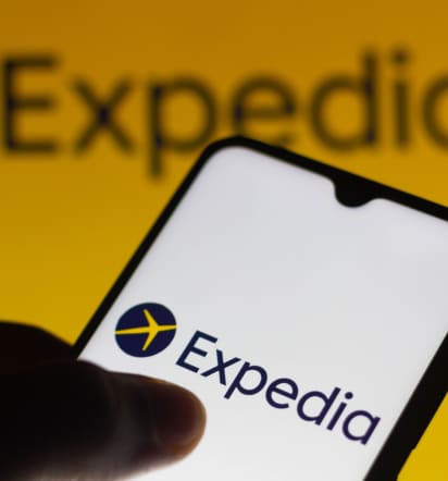 Stocks making the biggest moves midday: Apple, Expedia, Block and more