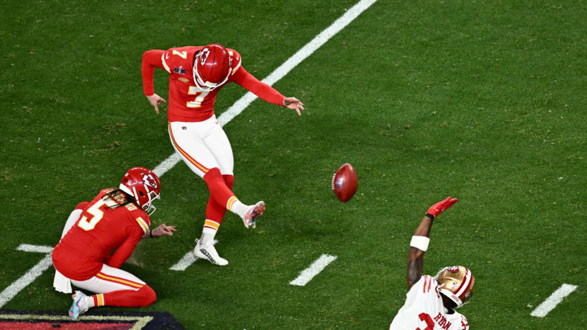 Kansas City Chiefs' kicker #07 Harrison Butker ties and sends the game to overtime during Super Bowl LVIII between the Kansas City Chiefs and the San Francisco 49ers at Allegiant Stadium in Las Vegas, Nevada, February 11, 2024. 