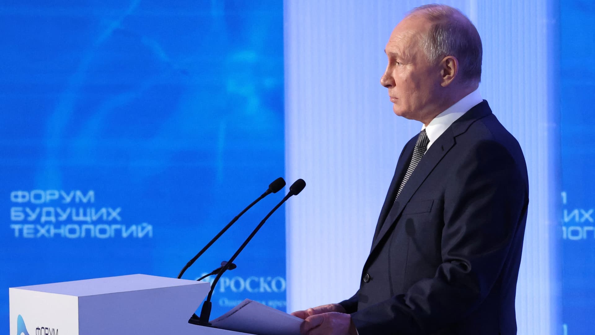 In this pool photograph distributed by Russian state agency Sputnik, Russia's President Vladimir Putin addresses the audience during the Future Technologies Forum at the World Trade Center in Moscow on February 14, 2024.
