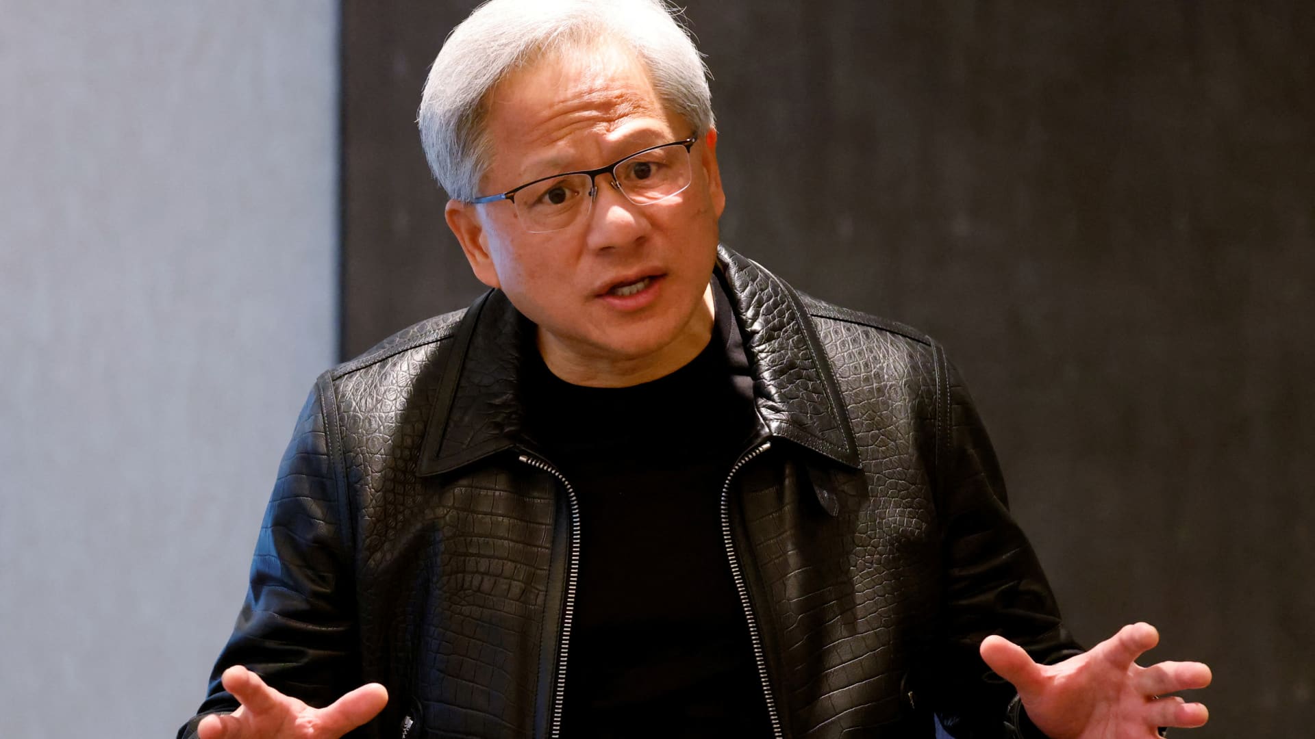 Nvidia CEO Jensen Huang attends a media roundtable meeting in Singapore on Dec. 6, 2023.