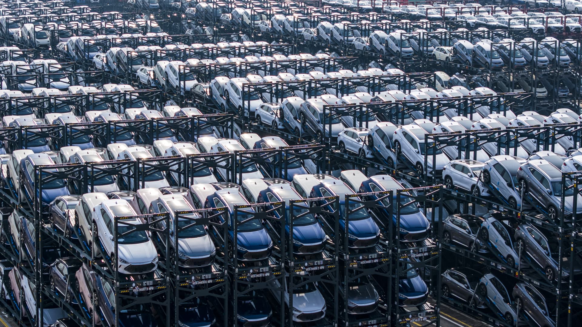 BYD electric cars waiting to be loaded onto a ship are seen stacked at the international container terminal of Taicang Port in Suzhou, in China's eastern Jiangsu province on February 8, 2024.