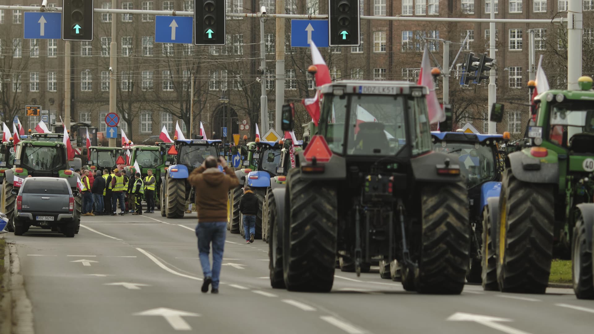 Tractors block a road during a protest by Polish farmers in Wroclaw, Poland, on Thursday, Feb. 15, 2024. Polish farmers launched a monthlong strike against what they describe as the uncontrolled influx of food products from Ukraine as well as the EU's agricultural and climate policespiling pressure on the new cabinet of Prime Minister Donald Tusk.