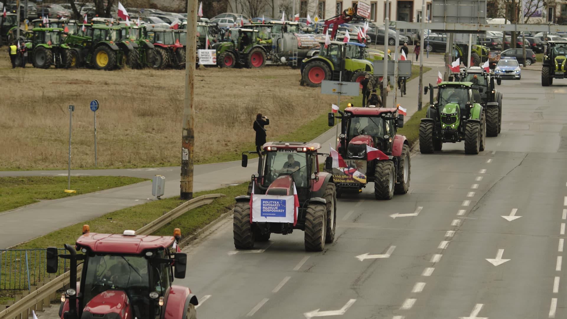 Farmers drive tractors to a blockade point during a protest by Polish farmers in Wroclaw, Poland, on Thursday, Feb. 15, 2024.